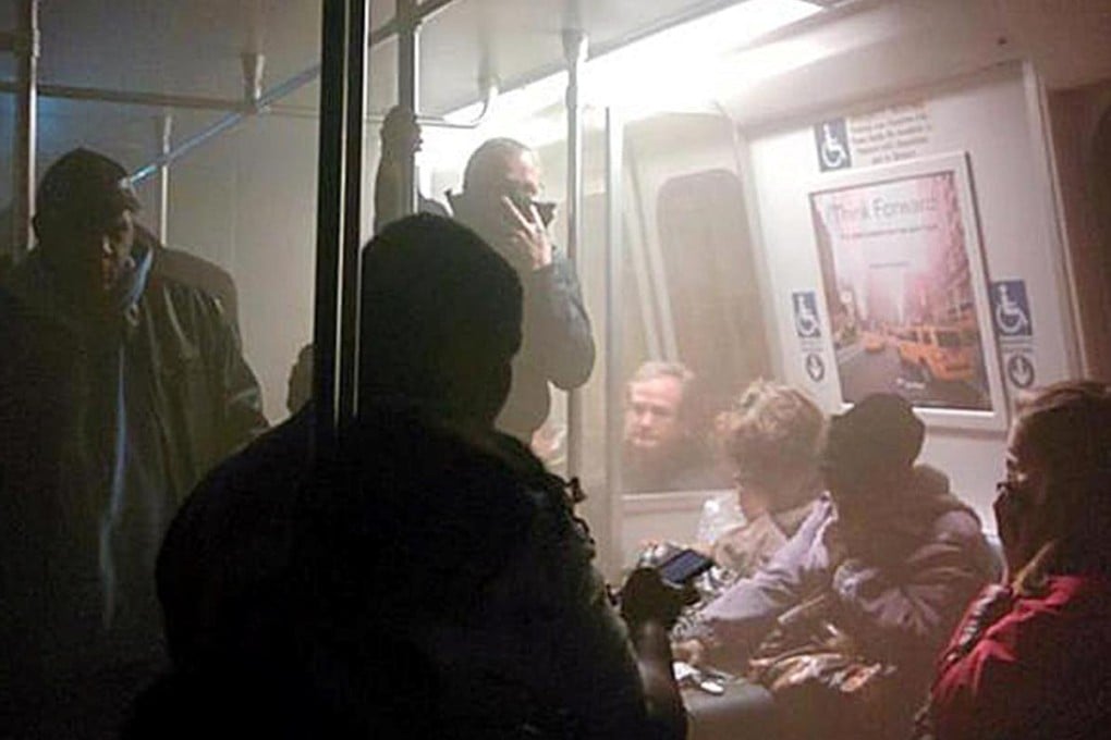 Smoke starts to fill a Metro train. Photo: EPA