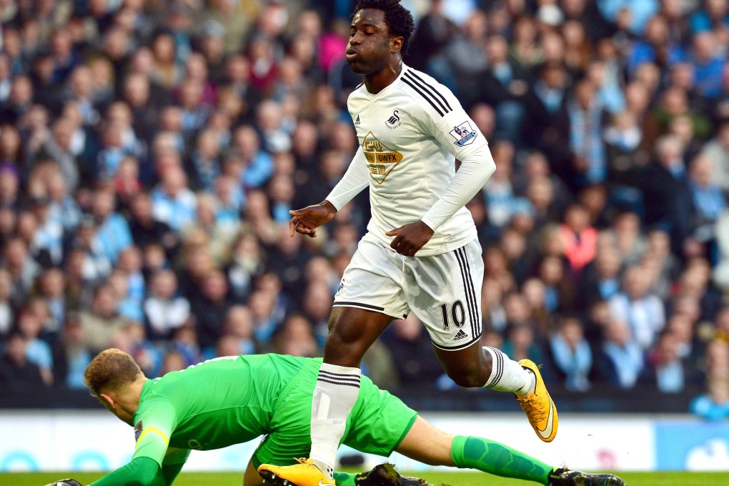 Wilfried Bony celebrates scoring for Swansea City against Manchester City. Now he will have to start scoring for the Manchester side. Photo: AFP