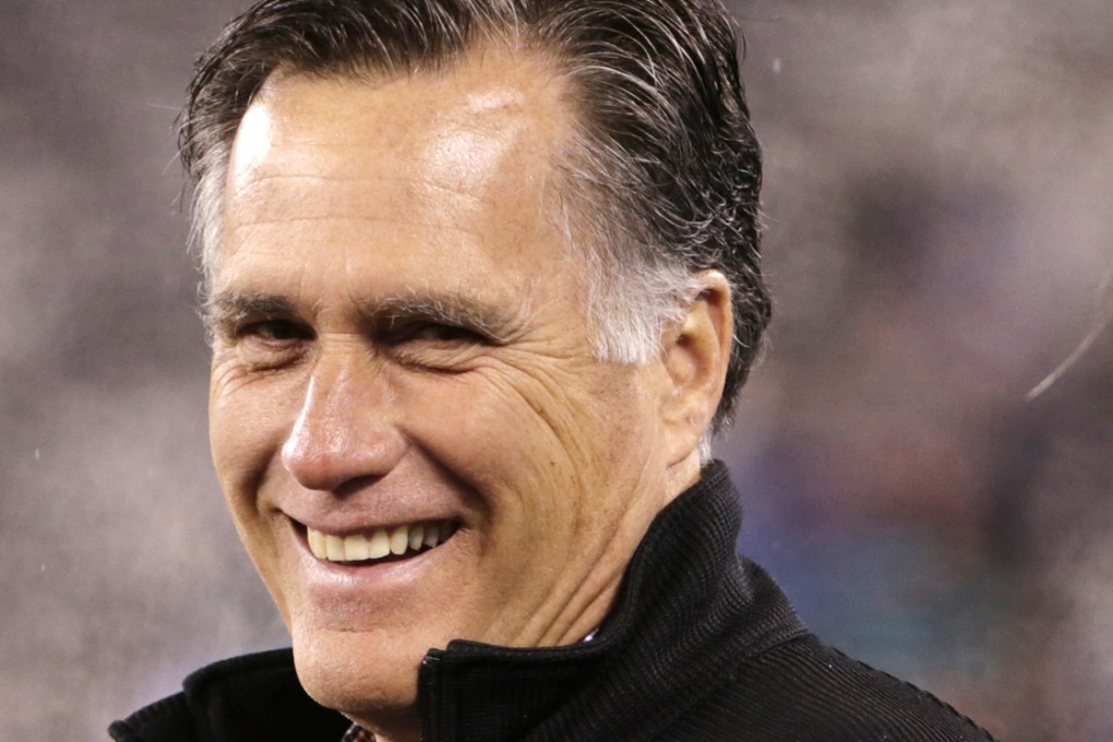 Mitt Romney attends an American football game in New Jersey early in December. Photo: AP