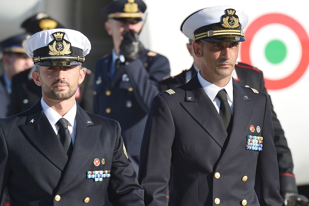 Italian marines Salvatore Girone (left) and Massimiliano Latorre pictured at Ciampino airport near Rome in December 2012. Photo: AFP