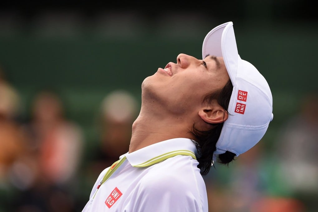 Japan's Kei Nishikori is relieved to make it through in difficult conditions at the Kooyong Classic in Melbourne. Photo: AFP