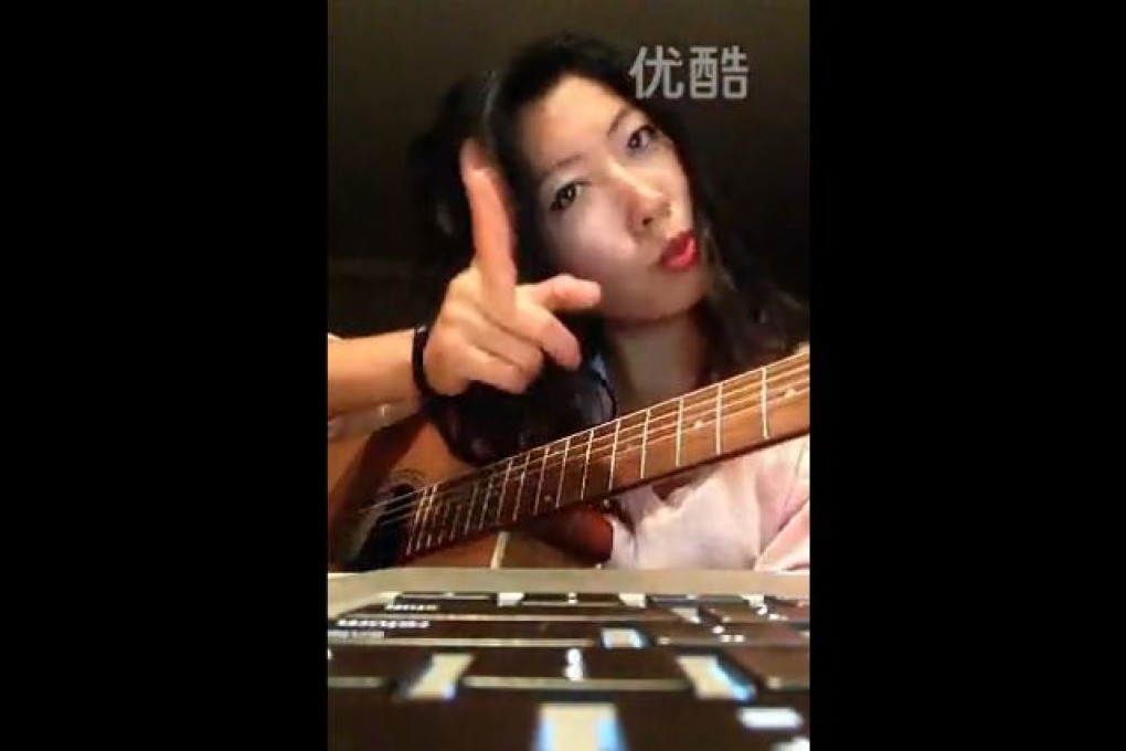 A screenshot from the Chinese Youku video-sharing site, in which Wanting Qu sings “Happy Birthday” to Vancouver mayor Gregor Robertson, when he turned 50 in September. Photo: Youku