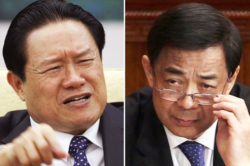 Zhou Yongkang (left) and Bo Xilai “celebrated their political rapport” and vowed to “play a big game”, the 'China Daily' reports. Photo: Reuters