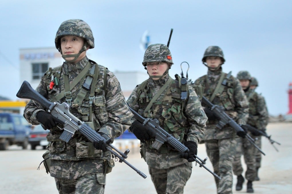 South Korean soldiers patrol the South-controlled island of Yeonpyeong.