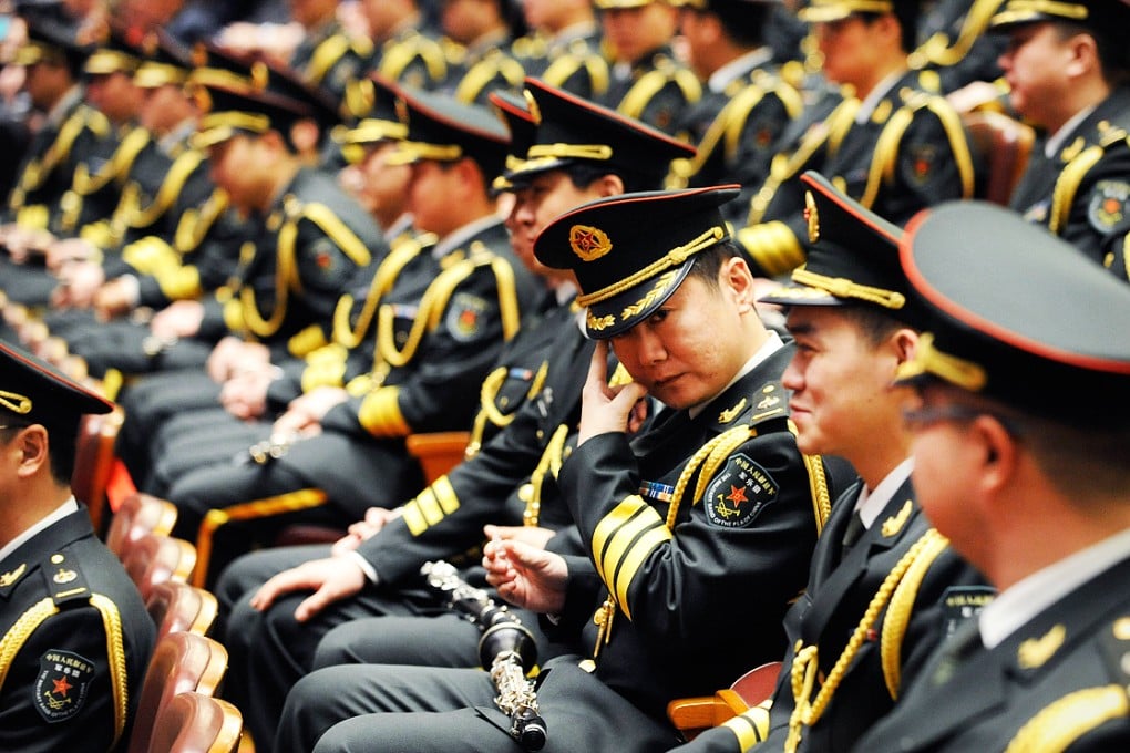 The military made a rare move yesterday by listing 16 senior commanders to come under investigation for graft over the last year. Photo: AFP