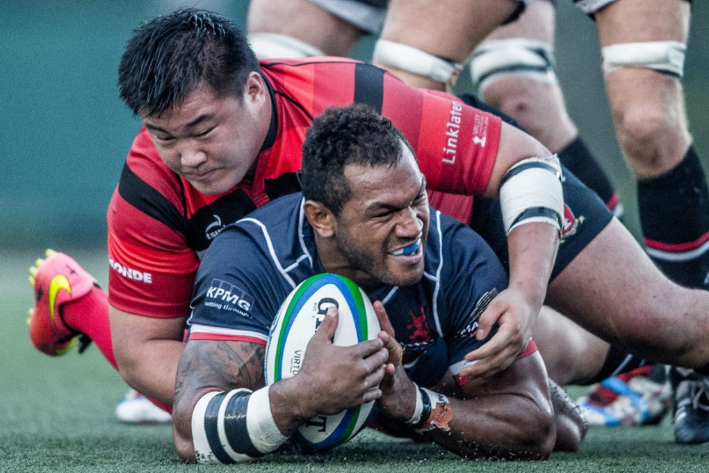 Valley’s Leon Wei Hon-sum gets to grips with Lex Kaleca of HK Scottish earlier this Premiership season. The teams meet again on Saturday with everything to play for as the playoffs near. Photos: HKRFU