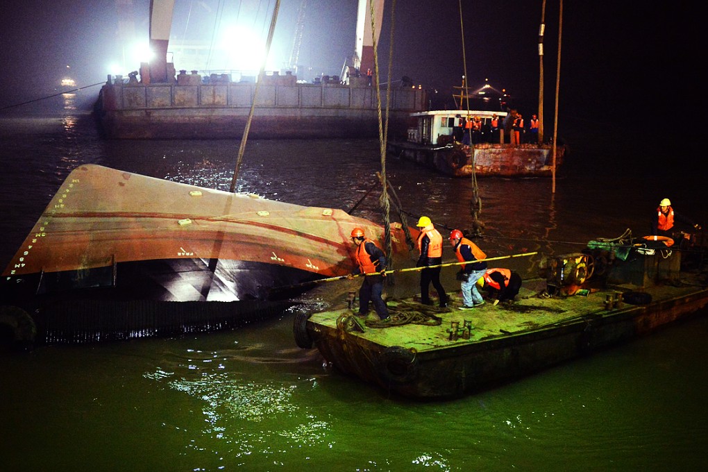 A Singaporean, Japanese nationals and a Frenchman, are among more than 20 people still missing after a tug boat overturned and sank in the Yangtze River last night. Photo: Xinhua