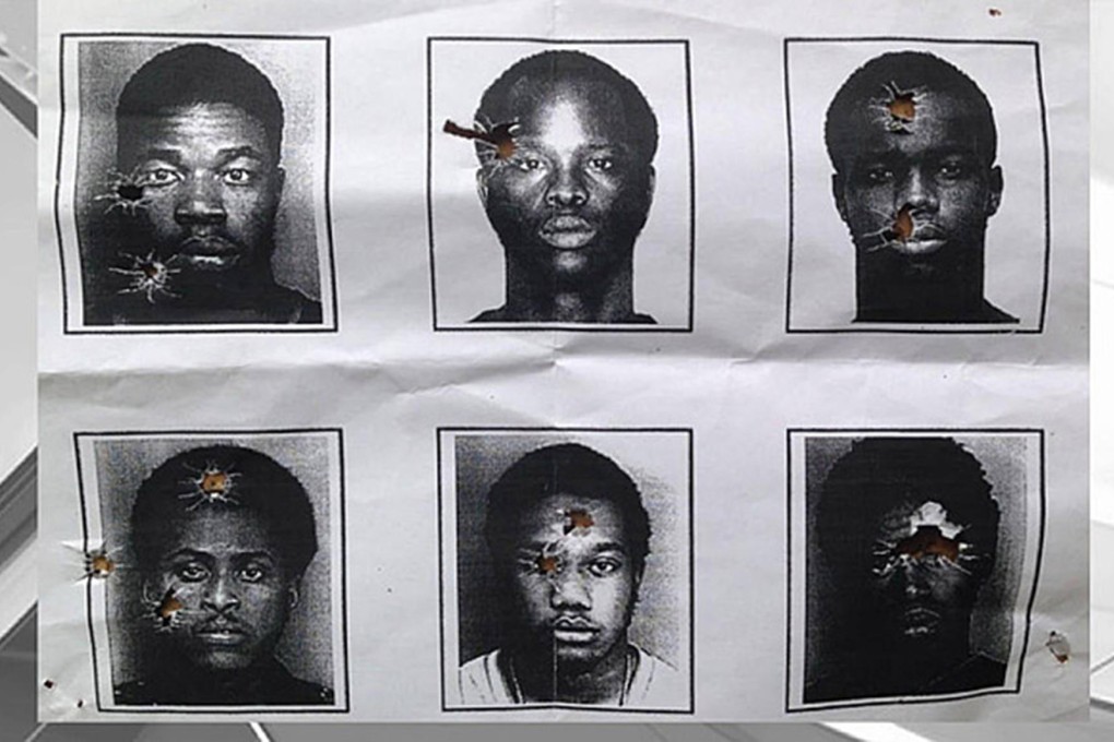 Bullet holes puncture mugshots of black suspects arrested more than 10 years ago after the police's training. Photo: SCMP