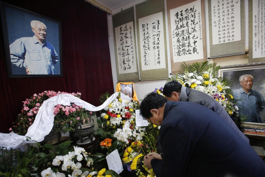 Mourners burn incense in front of a portrait of Zhao Ziyang on the 10th anniversary of his death at his house in Beijing. Photo: SMP