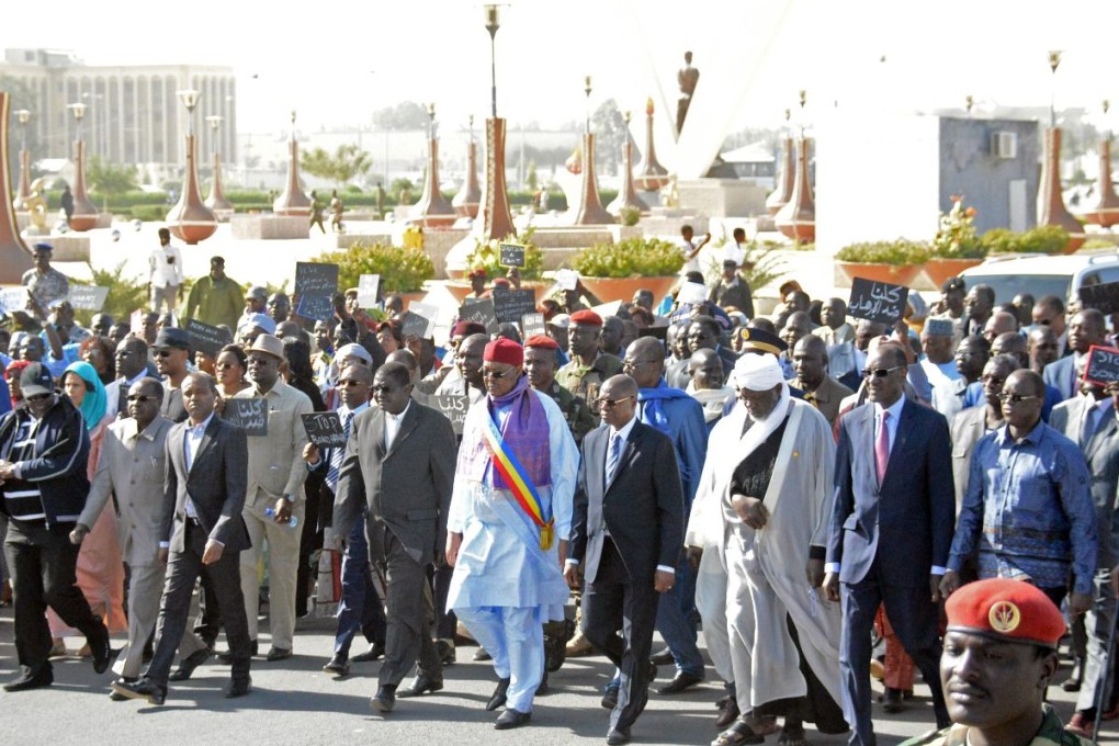 Chad's Prime Minister Kalzeube Pahimi Deubet (centre) and officials lead a rally in N'Djamena on January 17 to show support for the authorities' decision to send troops to fight Nigeria's Boko Haram Islamists. Photo: AFP