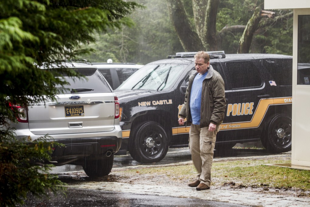A security official stands at the end of the driveway leading to US Vice-President Joe Biden’s home in Delaware on Sunday. Photo: AP