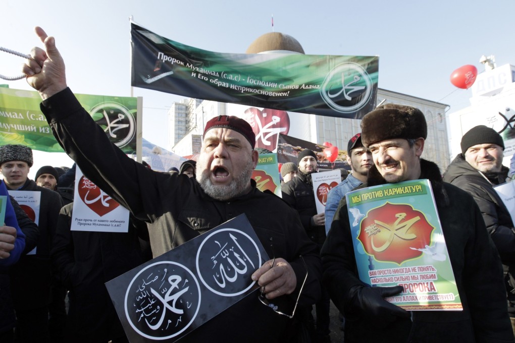 People attend a rally to protest against satirical cartoons of the Prophet Mohammed in Grozny, Chechnya, yesterday. Photo: Reuters