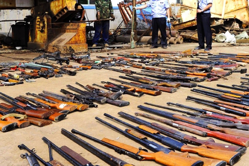 Some of the 10,500 illegal firearms seized by police in the city of Guiyang last April. Photo: Reuters