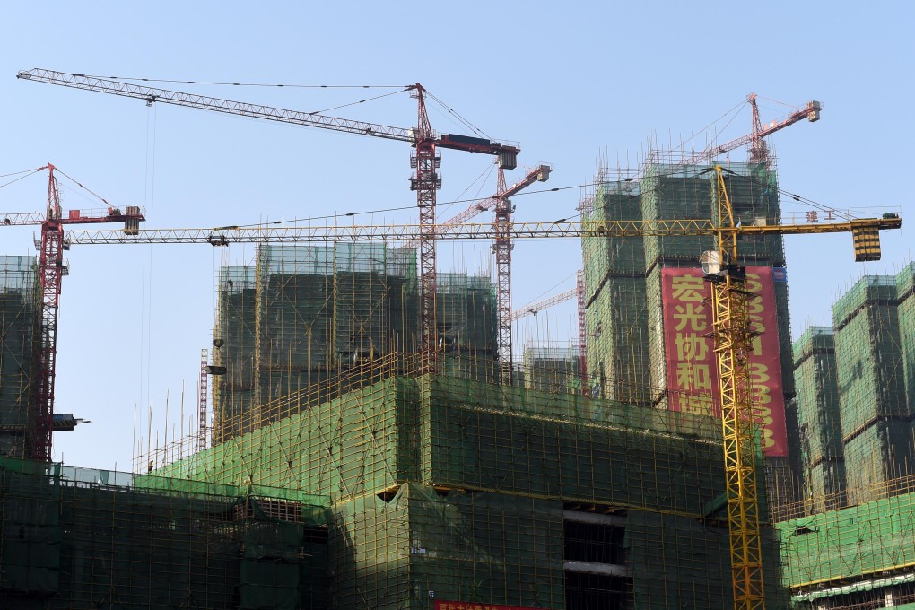 Local government officials blocking real estate sales and anti-corruption probes are adding to worries about the prospects of companies in the mainland's already highly leveraged property industry. Photo: Xinhua