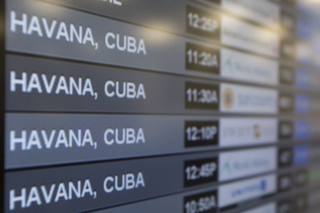 Charter flights to Havana are shown on a departures screen at Miami International Airport on Friday following the easing of travel restrictions. Photo: AP