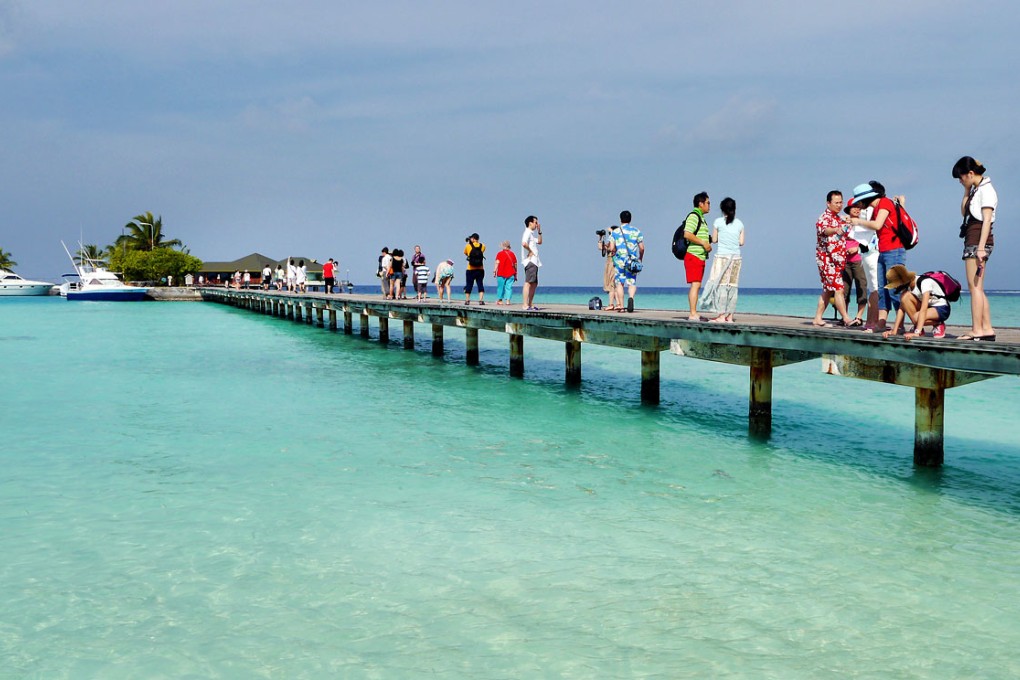 Chinese tourists soak up the holiday sun in the Maldives. Tourist arrivals from China in the remote Indian Ocean destination are on the rise. Photo: SCMP