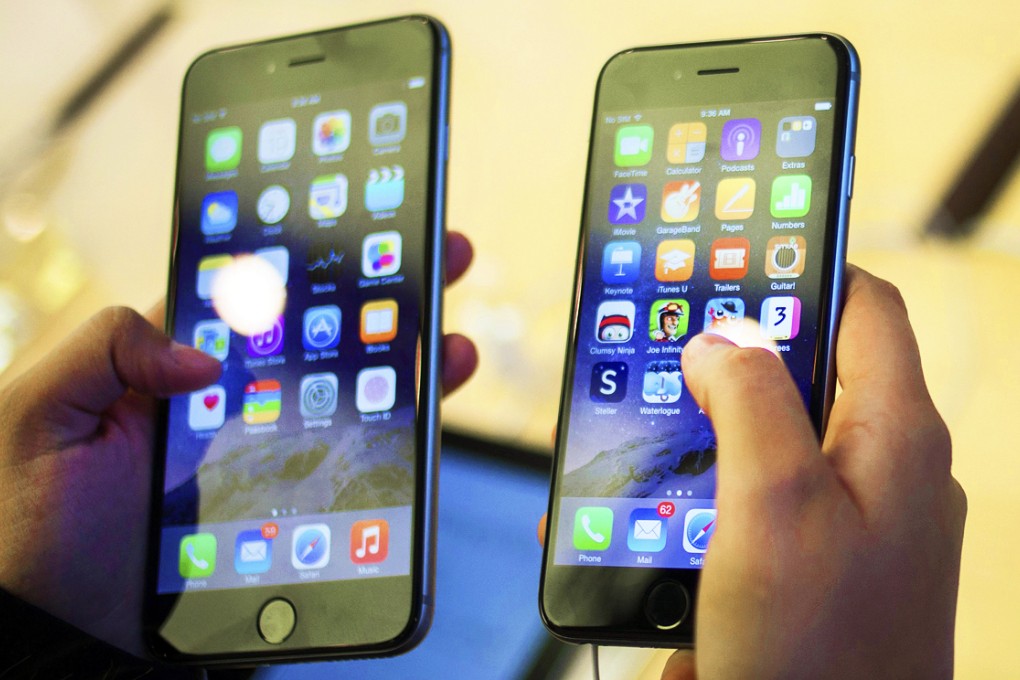 Three Chinese Microsoft researchers created the prototype of an automated phone charger using a torch and a sensor from an Xbox games console. Photo: Reuters