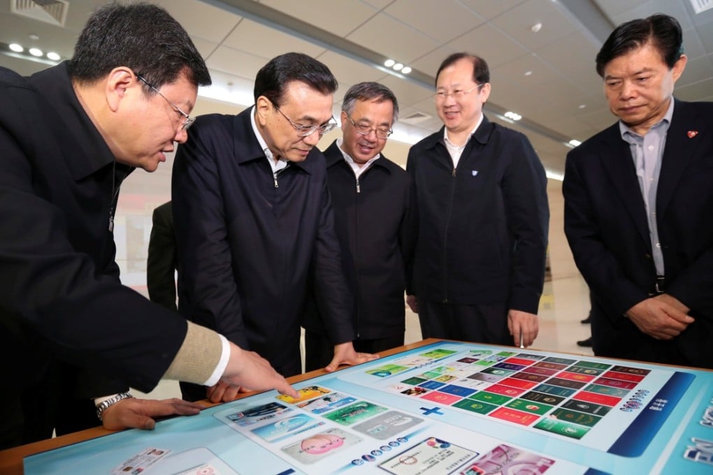 Premier Li Keqiang (2nd left) visits Nansha New Area of Guangdong Free Trade Zone in Guangzhou. Photo: Xinhua