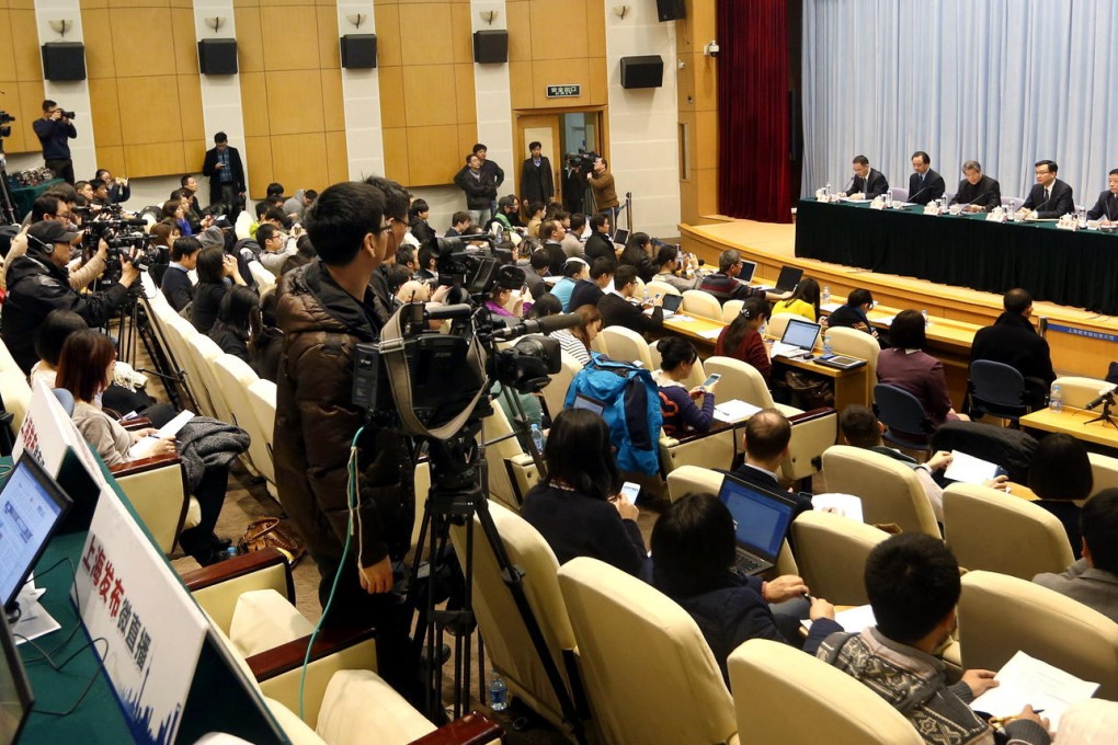 Investigators present their findings on the Shanghai stampede at a press conference yesterday. Photo: Xinhua