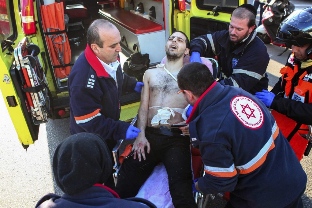 Twelve wounded as Palestinian attacker stabs passengers on Tel Aviv bus ...