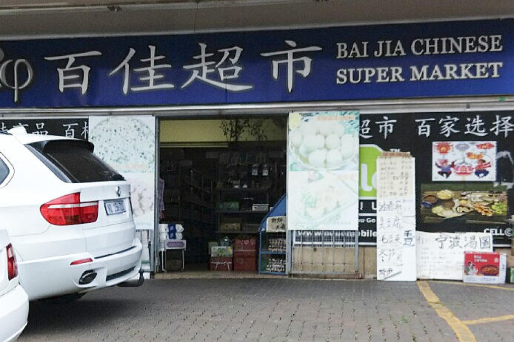 Chinese-run businesses such as the Bai Jia supermarket in Johannesburg (above) and Maple cloth store (below) are vulnerable to crime.