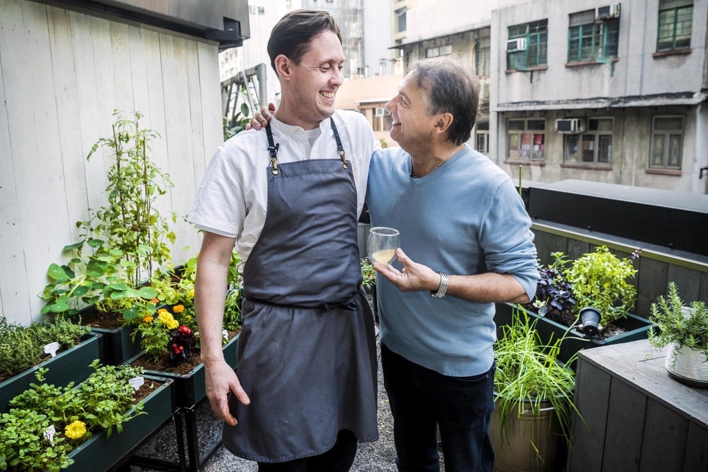 Nurdin Topham (left) and Raymond Blanc on the terrace of Nur, where the former grows herbs and edible flowers for the kitchen. Photo: Thomas Lee