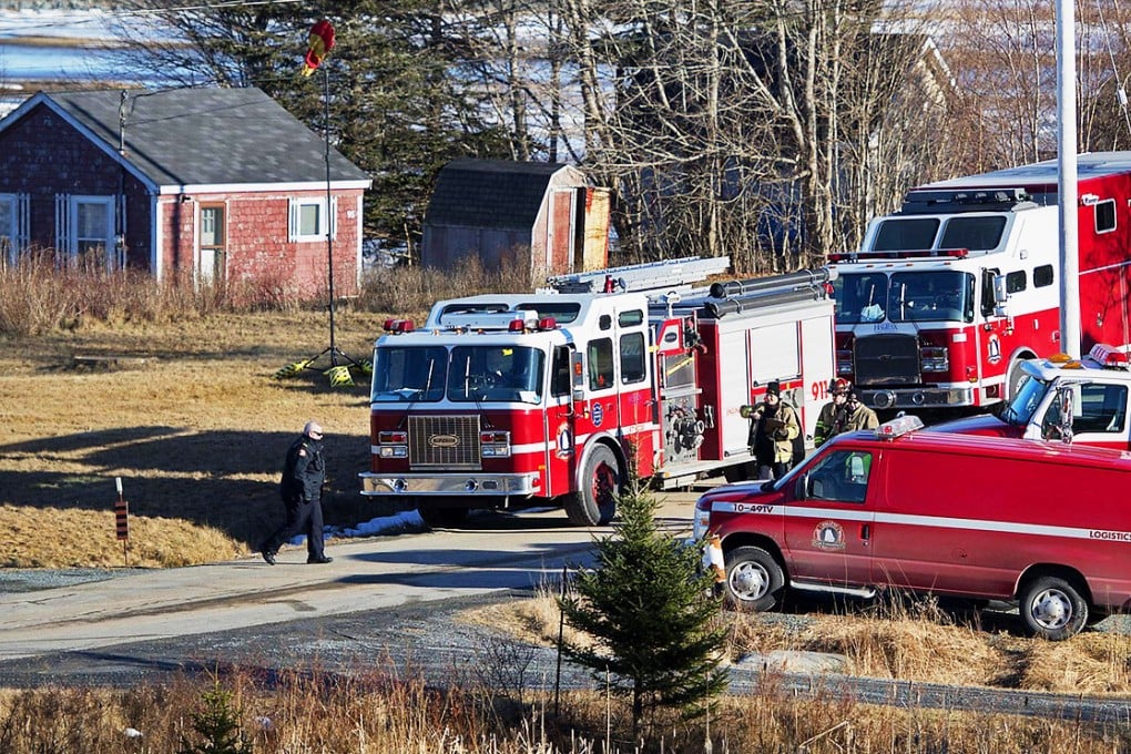 Firefighters remove the mystery chemicals from the scene. Photo: AP