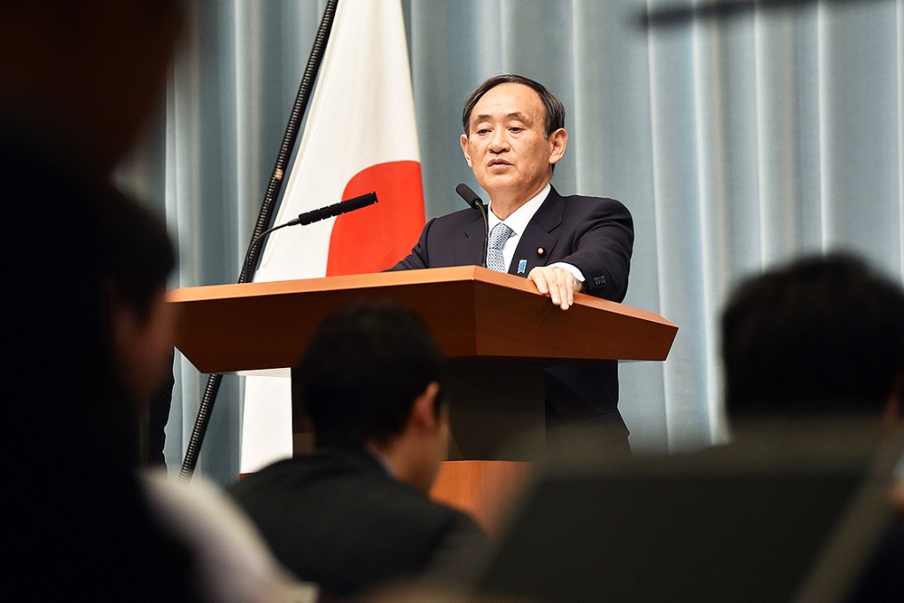 Japan's Chief Cabinet Secretary Yoshihide Suga answers questions during a press conference at the prime minister's official residence in Tokyo on Thursday. Photo: AFP