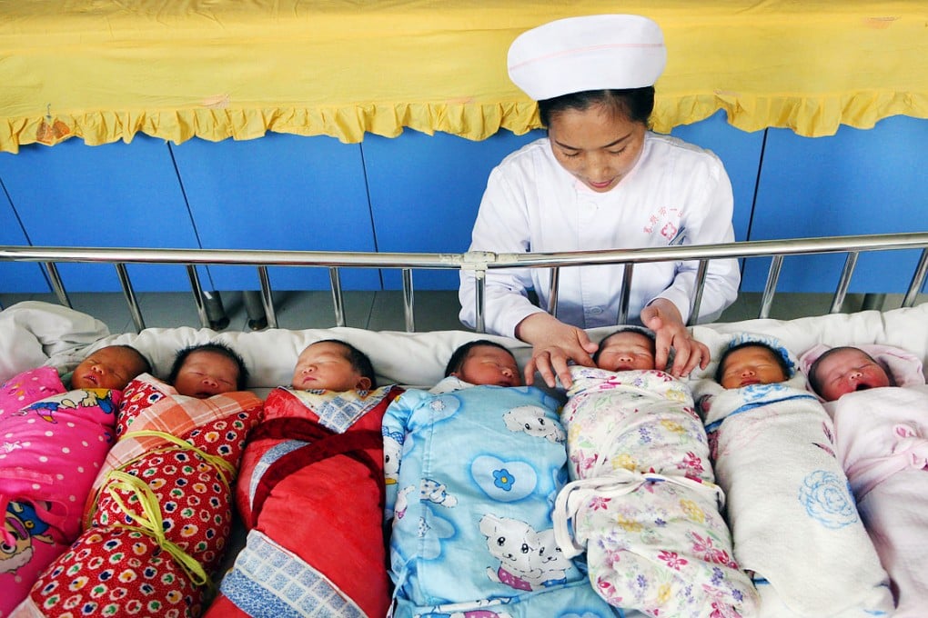A nurse attends to newborns in a hospital in China. The country's strict birth control policy in a culture that favours boys has resulted in a skewed gender ratio. Photo: Xinhua