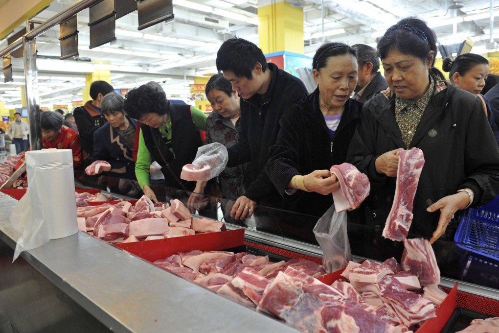 Eating preserved pork and sausages is a long-held tradition in Chongqing and many households traditionally smoke bacon before Lunar New Year. Photo: Reuters