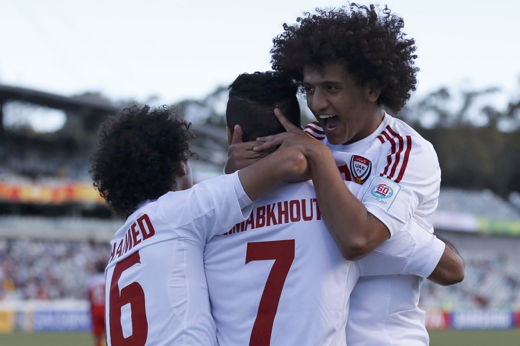 UAE's Mohamed Abdulrahman (right) has lit up the Asian Cup with some exciting performances. Photo: Reuters