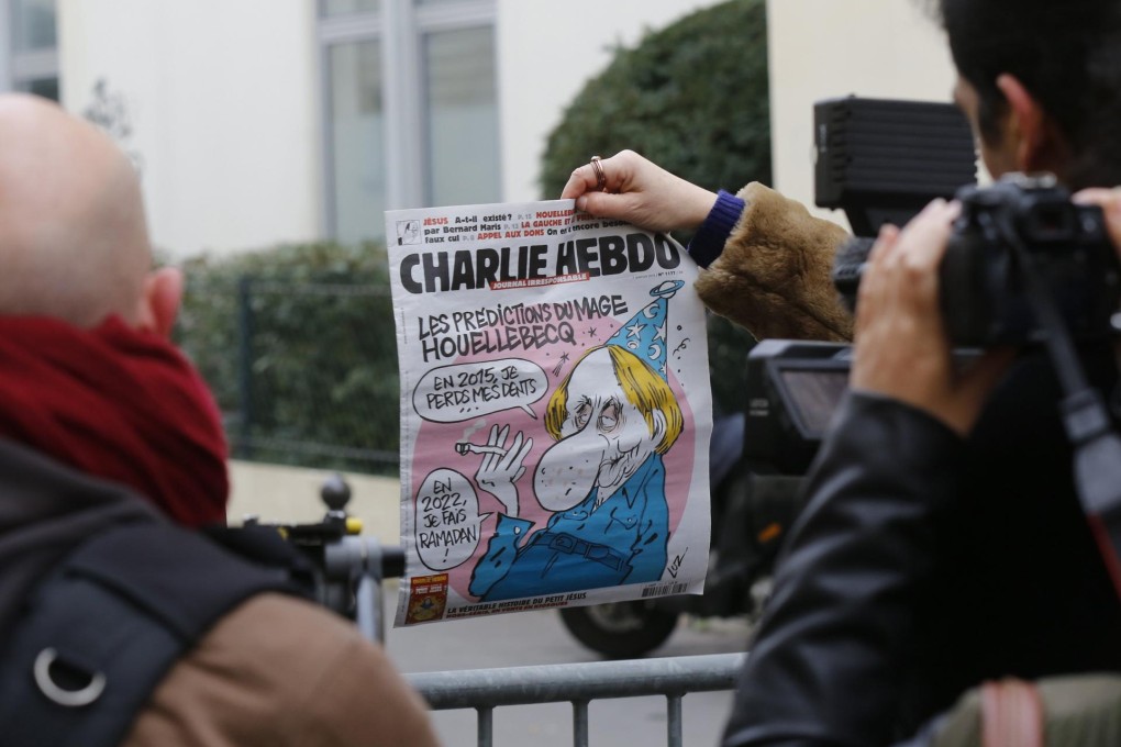 Michel Houellebecq's caricature was on the cover of Charlie Hebdo on the day of the massacre. Photo: Reuters