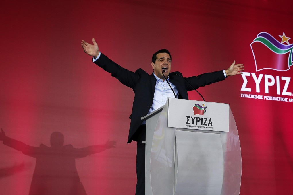 Syriza party leader Alexis Tsipras addresses supporters during a campaign rally in Athens. Photo: Reuters