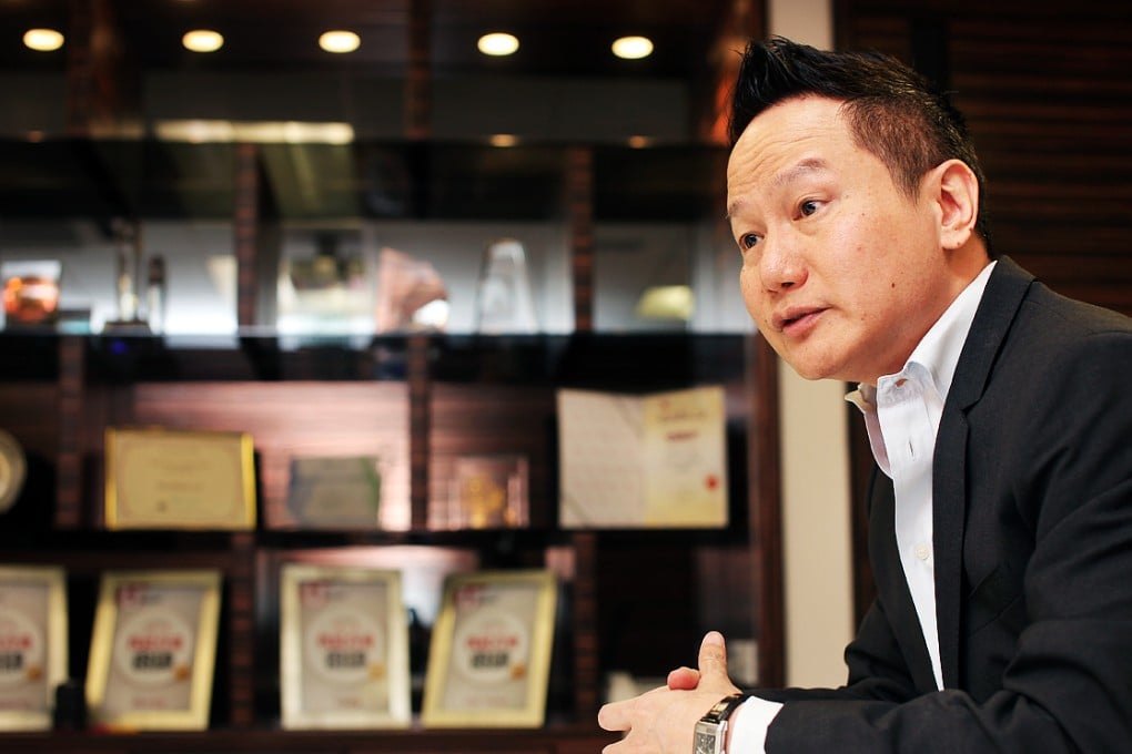 Liu Kit-man has denied one count of fraud and one of using a false document, for inducing his former company to hire the company he co-owned. Photo: Paul Yeung