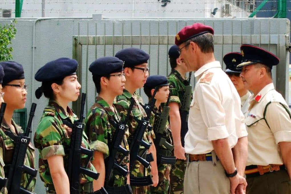 Brigadier Duncan Francis inspect cadets in March 2013. Photo: Facebook