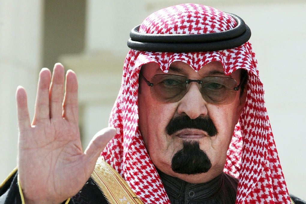 Crown Prince Abdullah waves as he arrives to open a conference in Riyadh, in this Feburary 5, 2005 file photo. Photo: Reuters