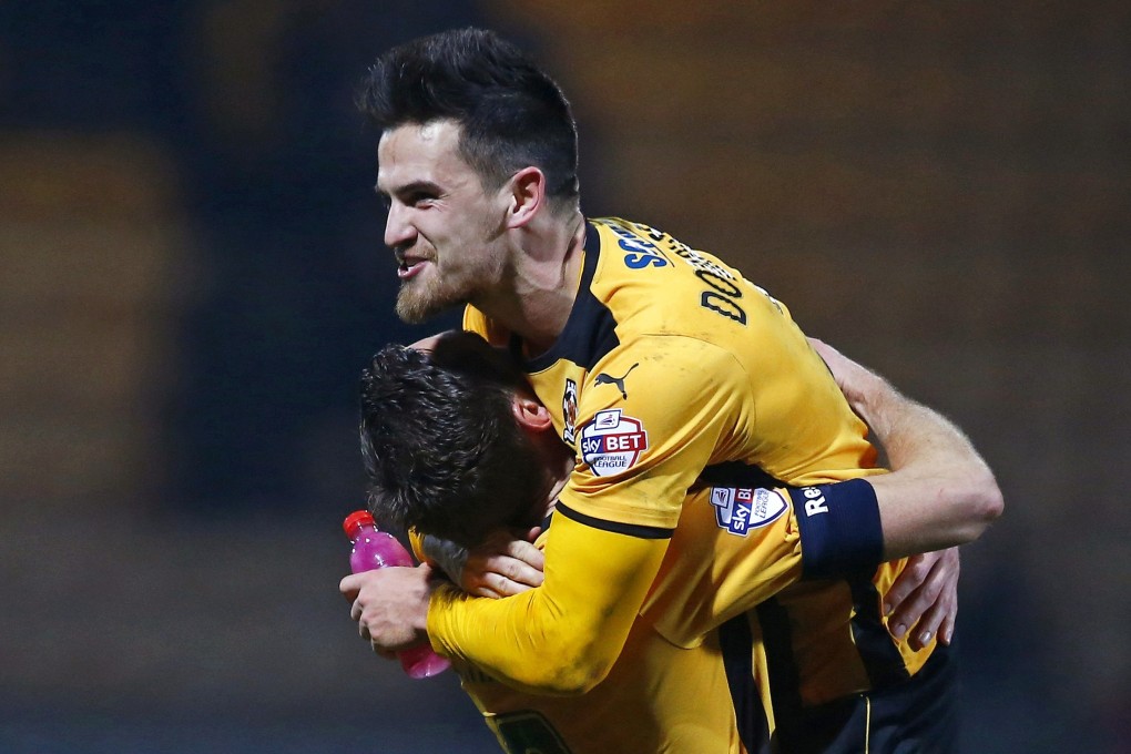 Cambridge's Ryan Donaldson and Tom Champion celebrate. Photo: Reuters