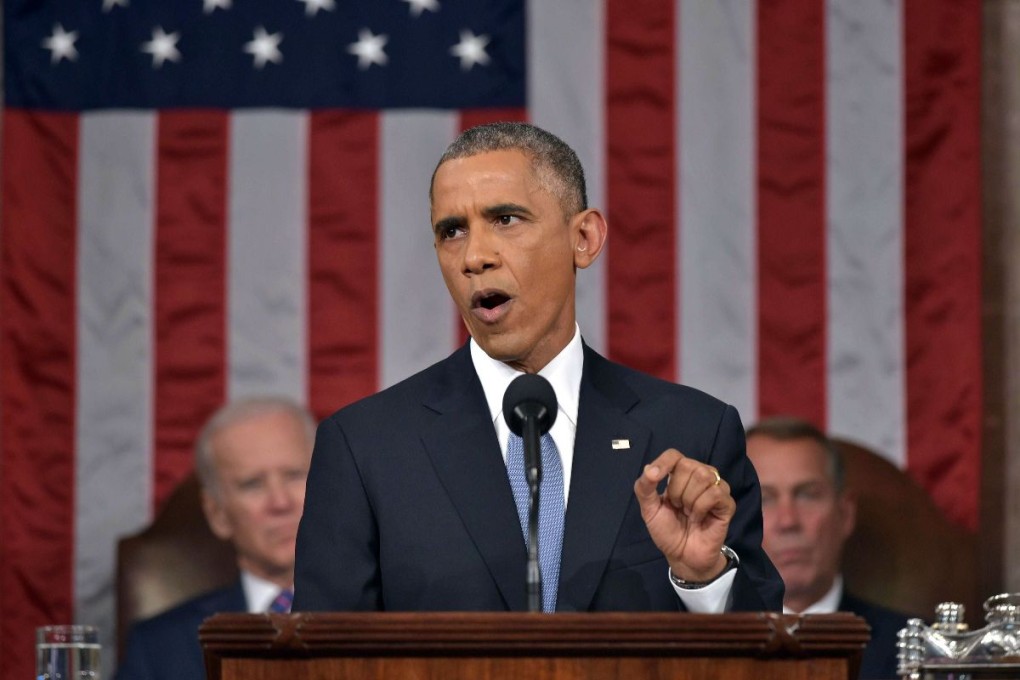 US President Barack Obama (C) delivers his State of the Union address. Photo: Reuters