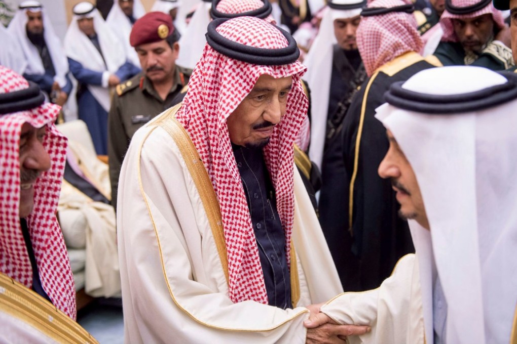 Saudi's newly enthroned King Salman (centre) receives pledges of loyalty following the death of King Abdullah during his funeral. Photo: AP