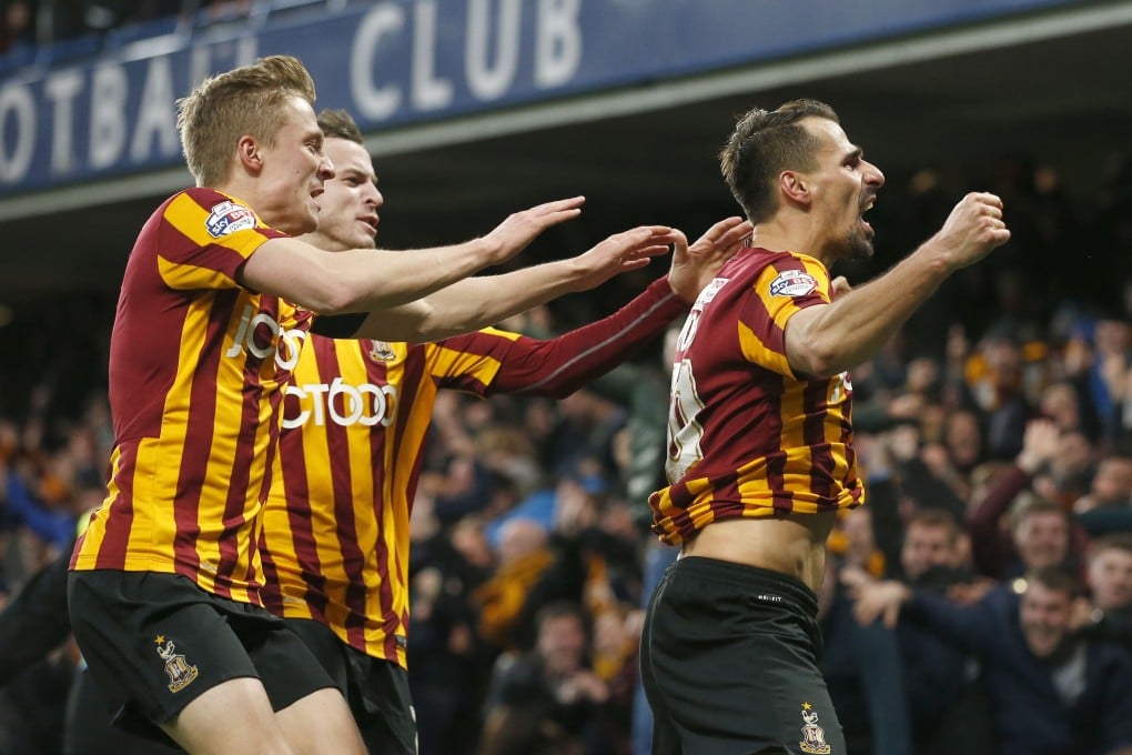 Bradford City midfielder Filipe Morais (right) celebrates with teammates after scoring against Chelsea in their FA Cup fourth-round match at Stamford Bridge. Bradford won 4-2 in a massive upset. Photo: AFP