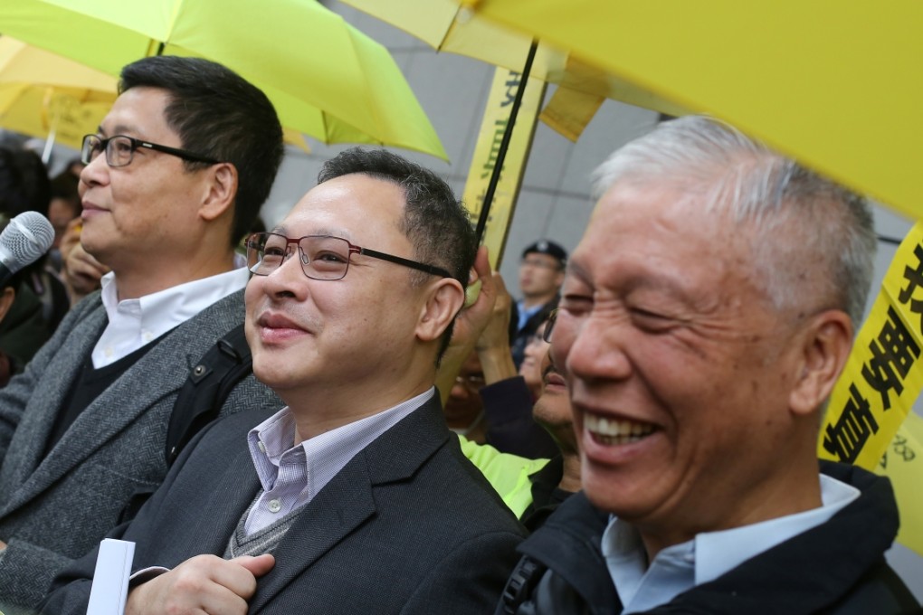 (From left) Occupy co-founders Chan Kin-man, Benny Tai Yiu-ting and Chu Yiu-ming meet the media outside Police Headquarter in Wan Chai. Photo: Sam Tsang