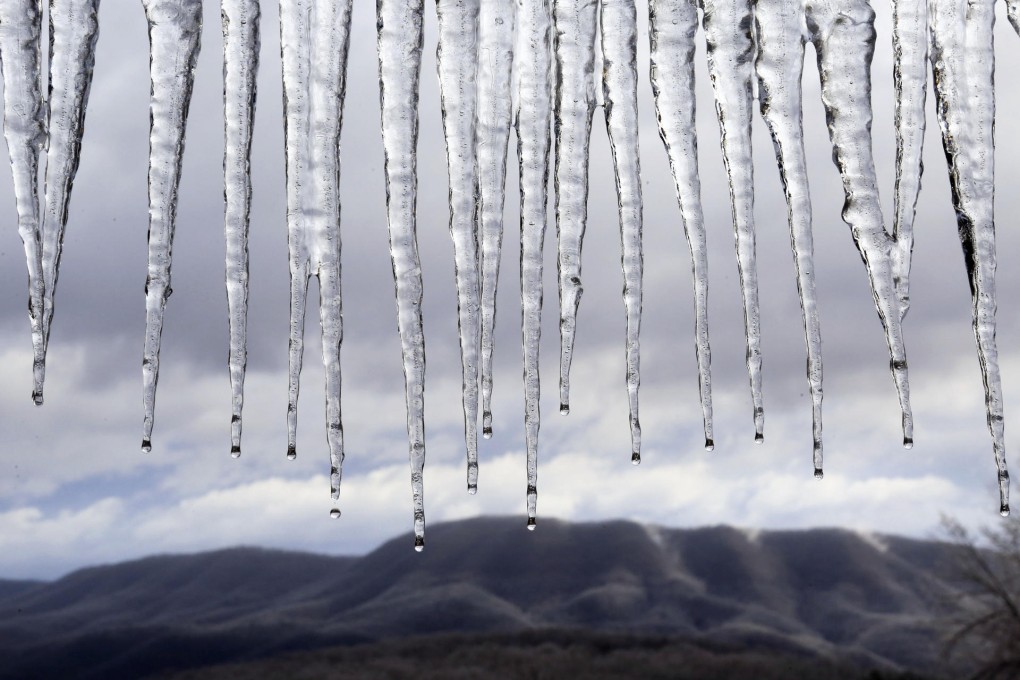 Icicles drip in Virginia amid fears the weather system could be worse than New York's 2006 blizzard. Photo: AP