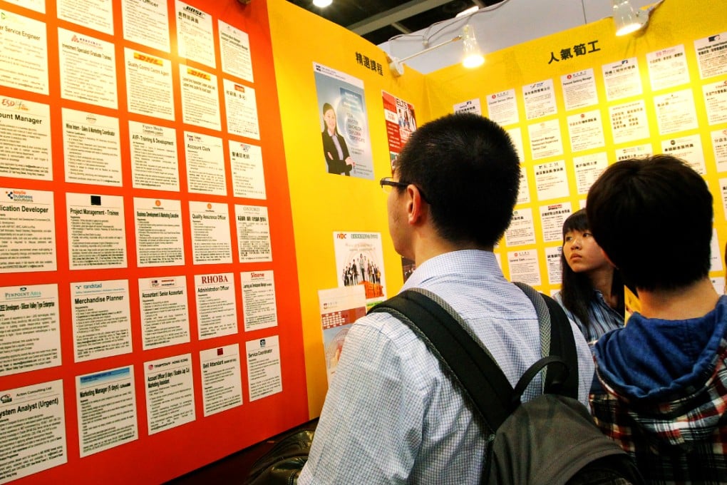 A job board festooned with positions at Hong Kong's Education and Careers Expo. The financial services sector's job growth is expected to hit 15 per cent. Photo:  May Tse