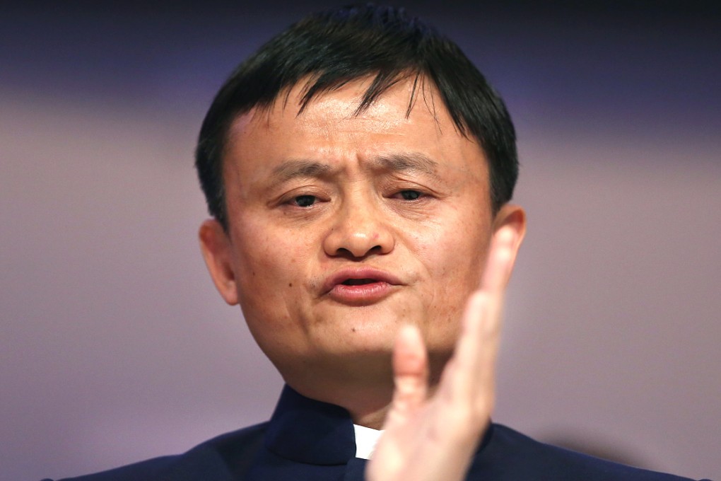 The Standard Chartered logo flies behind China's flag in Hong Kong's Central business district. The lender's shares fell on Monday on reports its CEO, Peter Sands, will be replaced by year end. Photo: Bloomberg