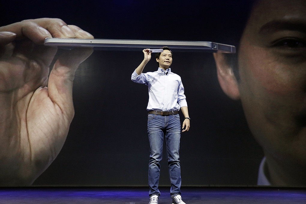 Lei Jun, founder and Chief Executive Officer of China's mobile company Xiaomi, speaks at the launch ceremony of the Mi Note in Beijing. Photo: Reuters