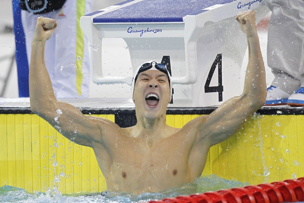 Park Tae-hwan celebrates after winning the 100m freestyle final at the 2010 Asian Games in Guangzhou. Photo: Xinhua
