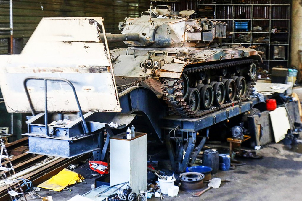 The hull of US-made M-41 tank amid vehicles. Photo: AFP