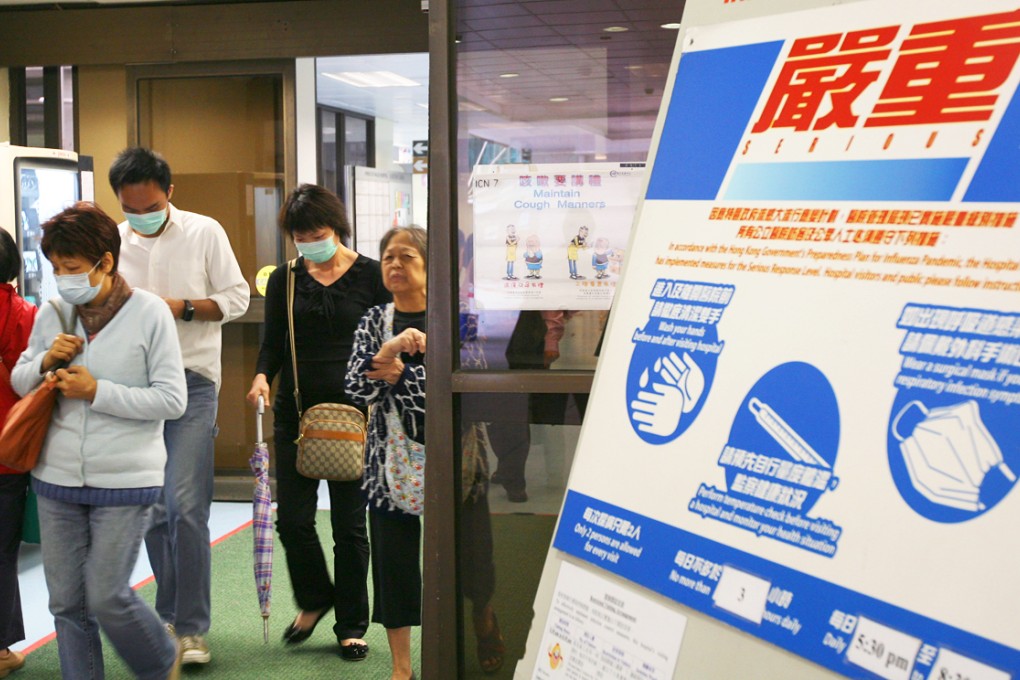 With the epidemic adding a huge burden to public hospitals, staff are trying their best to group flu patients in the same medical wards. Photo: David Wong