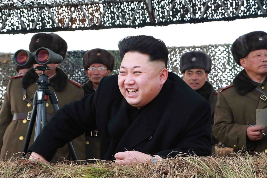 North Korean leader Kim Jong Un laughs as he watch a winter river-crossing attack drill of the armored infantry sub-units of the motorized strike group in Pyongyang on January 27, 2015. Photo: Reuters