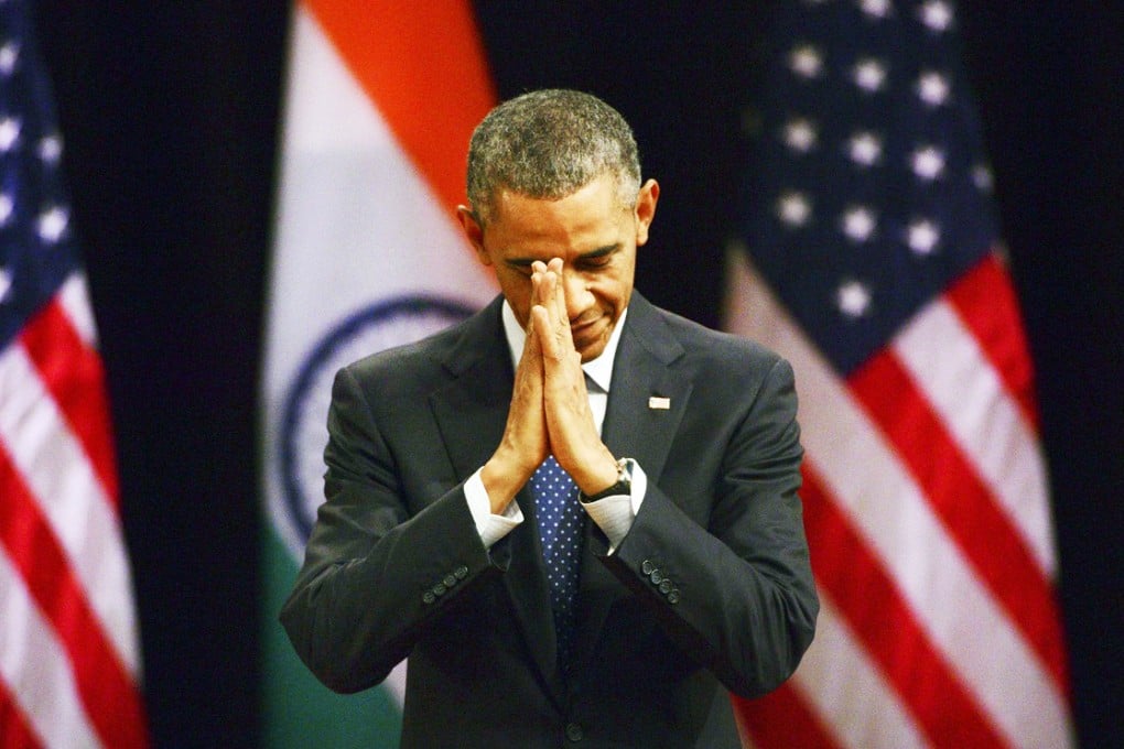 Barack Obama greets in a traditional Indian way. Photo: EPA